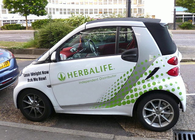  Herbalife branded car<span id=